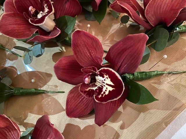 Burgundy Orchid Buttonhole